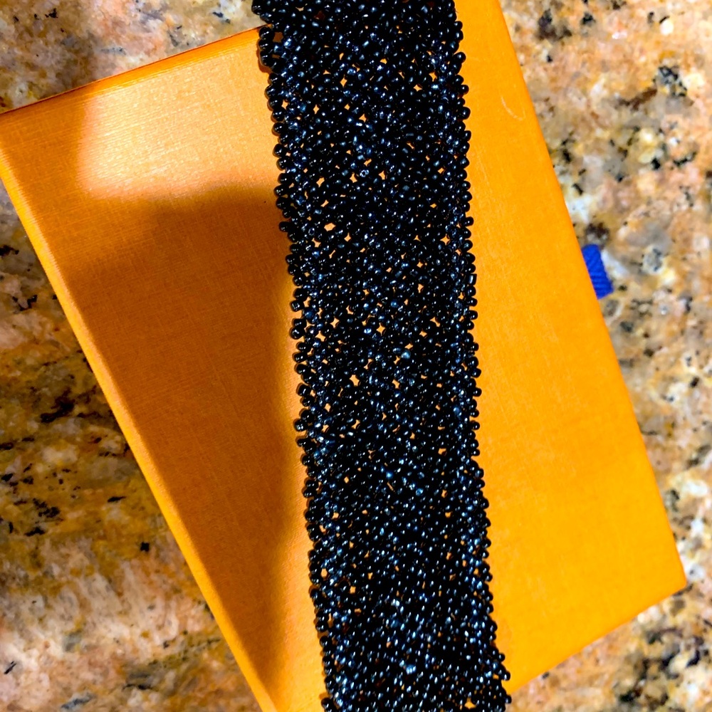 Stunning beaded black hand made bracelet. Must have for fashion diva. “Like new!